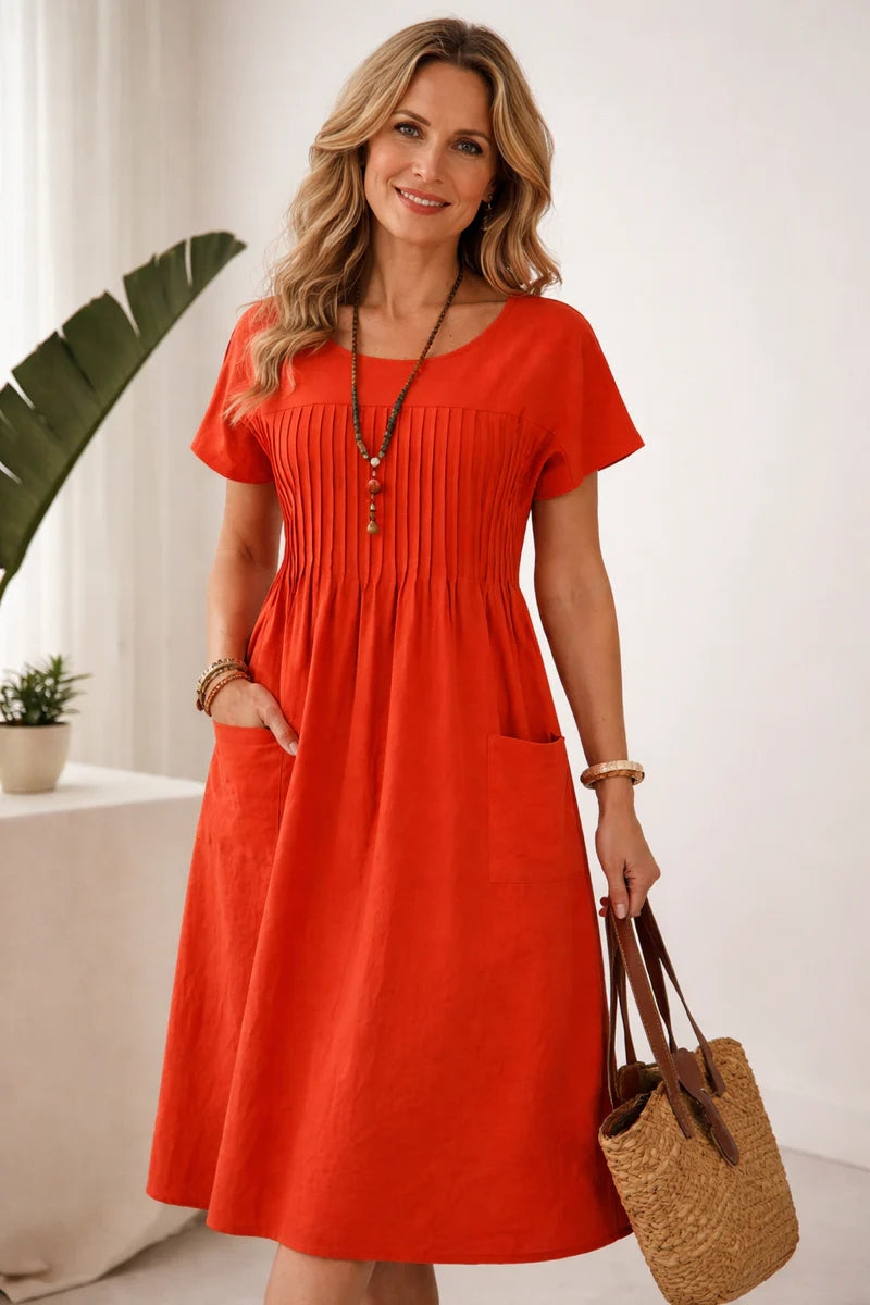 Damska sukienka midi z krótkim rękawem, okrągłym dekoltem i plisowanym przodem