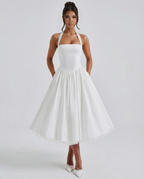 Damska sukienka midi z dekoltem halter i wiązaniem na plecach