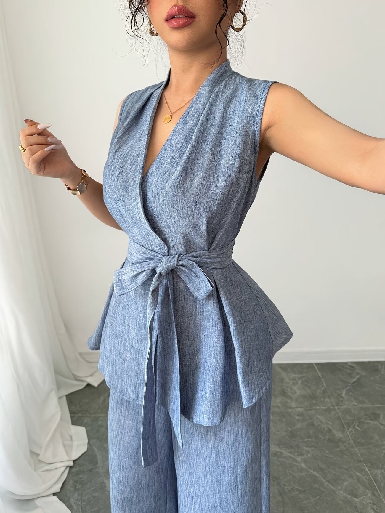 Damski komplet dwuczęściowy z kopertowym przodem