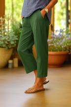 Damskie lniane spodnie capri relaxed fit z kieszeniami i mankietami