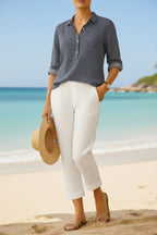 Damskie lniane spodnie capri relaxed fit z kieszeniami i mankietami